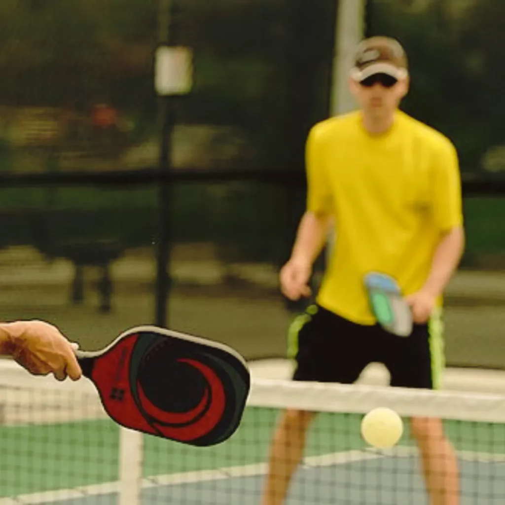 a man waiting to respond pickleball